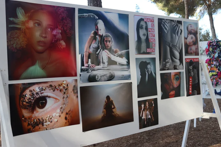 An outdoor board of student photography