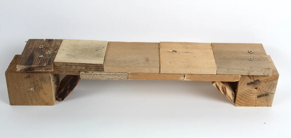 A low bench made from reclaimed wood