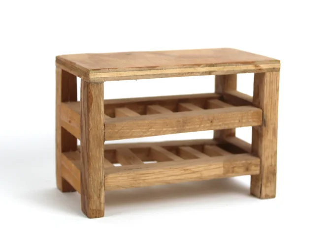 A wooden side table with a slatted shelf