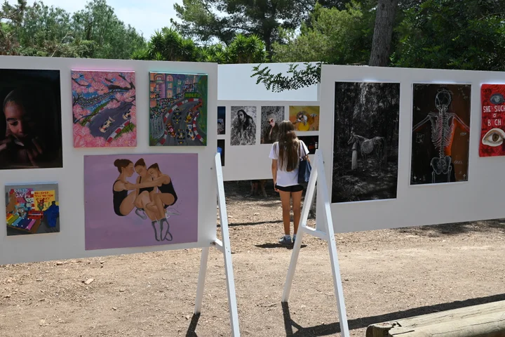 Rows of display boards with student artwork