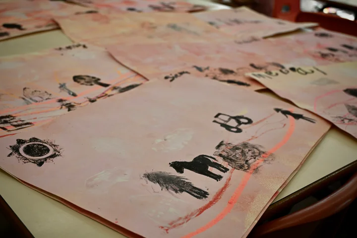 Close-up of an EYFS silhouette print of a horse and a tractor