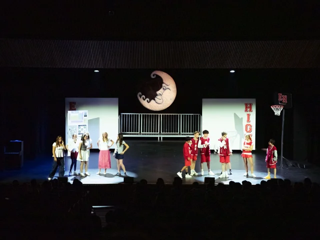 Secondary students on stage in the High School Musical production