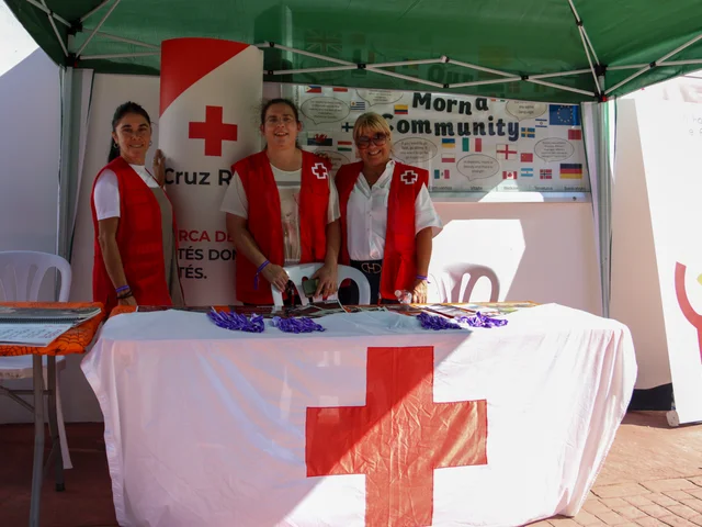 Cruz Roja volunteers at their stall at the Autumn Fair