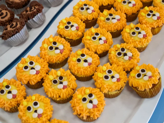 Lion cupcakes with orange icing at the Africa Bake Off