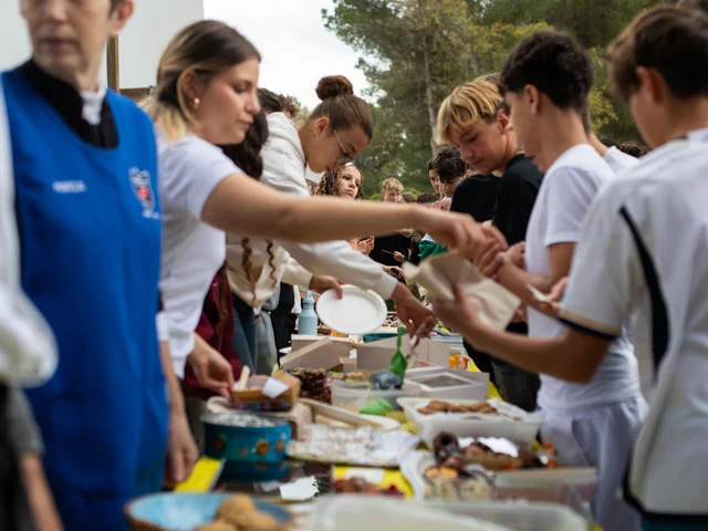 Students queueing along the cake tables to buy at the Africa Bake Off
