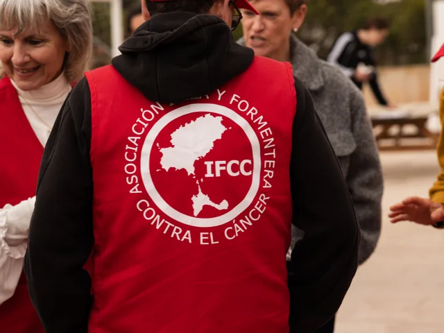 IFCC volunteers in red vests at the event