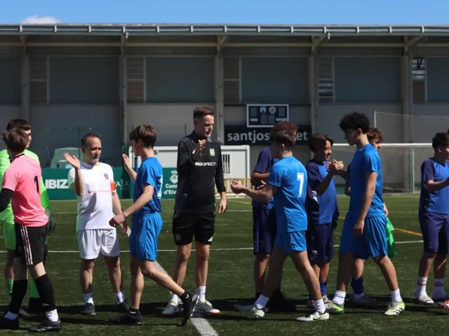 Scott Wright of Coerver Coaching in the handshake line with the players after a match