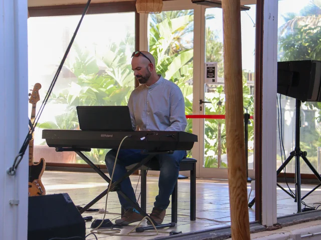 Young musicians playing together on stage