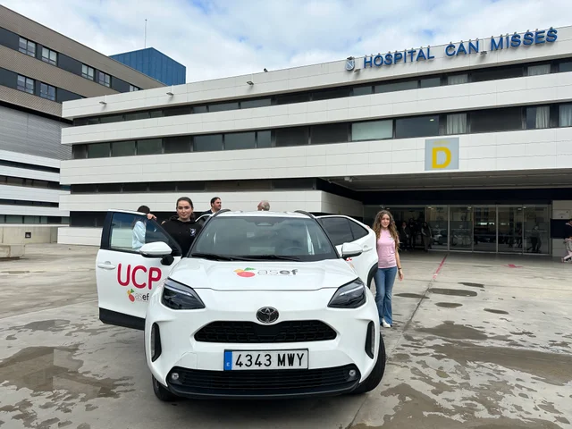 The new white palliative care car outside Hospital Can Misses