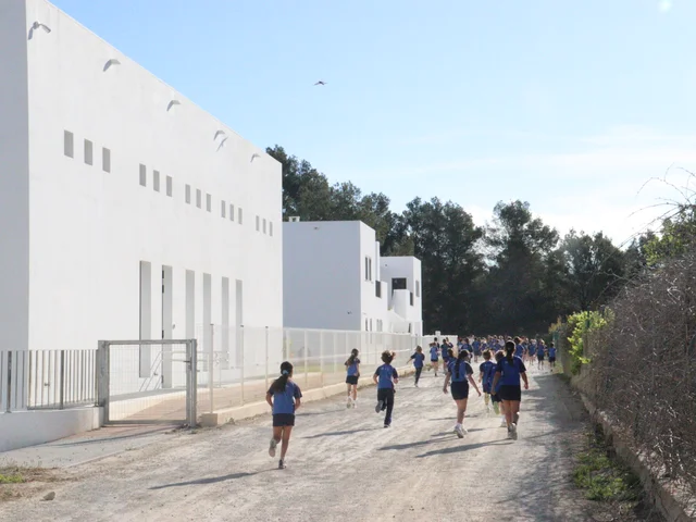 Runners making their way around the campus route