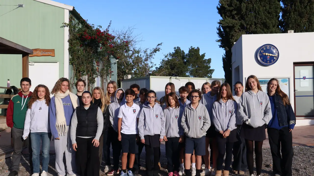 Morna's student leaders gathered outside on the campus on a sunny morning