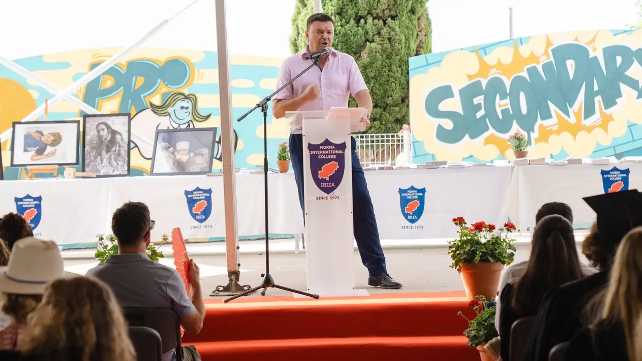 Bernie Cox, Head Teacher, addressing students and families at a school ceremony
